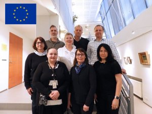 Na fotografii: grupa kobiet i mężczyzn uczestników spotkania  w ramach projektu AFORE „Accreditation of Forensic Laboratories in Europe” w Finlandii